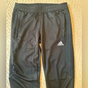 Adidas warm up pants, black stripes, size small. Like new.